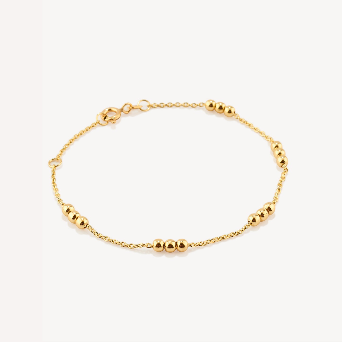 Pulsera Bolitas Triple Oro 18k