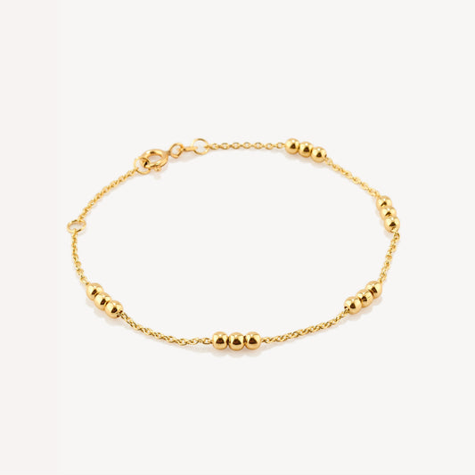 Pulsera Bolitas Triple Oro 18k